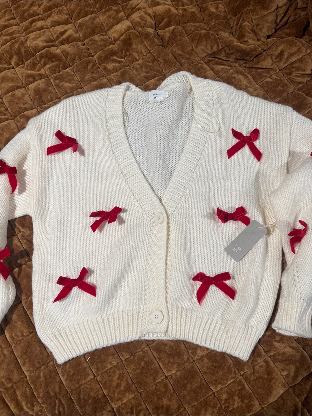 Ivory V‑Neck Cardigan with Red Velvet Bow Accents